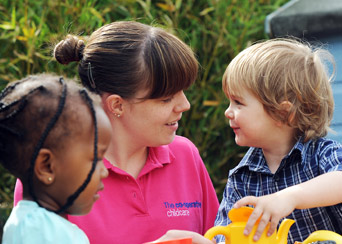 cooperative childcare carer and child
