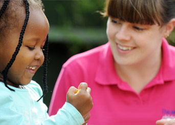 member of staff with child