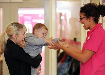 happy child being left at nursery
